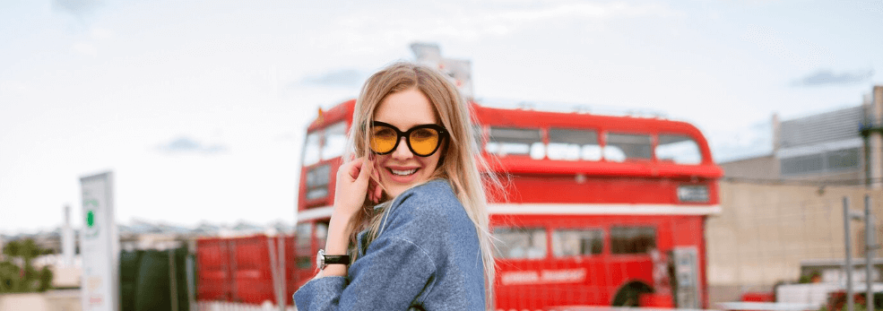 Lady in front of bus