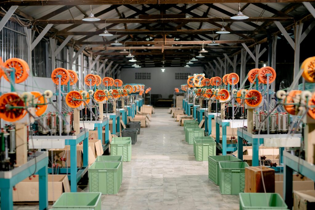 pexels-photo-14804699-14804699 Spacious industrial hall with machinery and equipment for manufacturing. Ideal stock image for industry themes.
