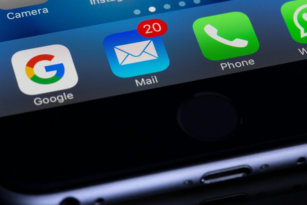pexels-photo-193003-193003 A close-up photo of a smartphone displaying popular apps like Google and Mail.